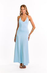 Model wears a light blue halter neck maxi dress. This elegant formal dress has a keyhole bust cut out and a flowing maxi skirt. A stunning choice for a wedding guest or prom.