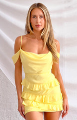 yellow mini dress with frills worn by a blond model