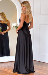 blonde model wearing a black satin formal gown with a lace up corset back detail
