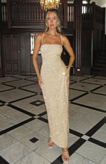 Sparkly gold maxi dress with thin straps on blonde model
