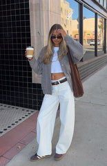 Model in a stylish grey textured bomber jacket and wide-leg pants a perfect casual street style outfit for the Fall season