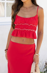 Model wears the Wiatt Red Top styled with the matching maxi skirt a stunning co-ord for a summer vacation or special event.