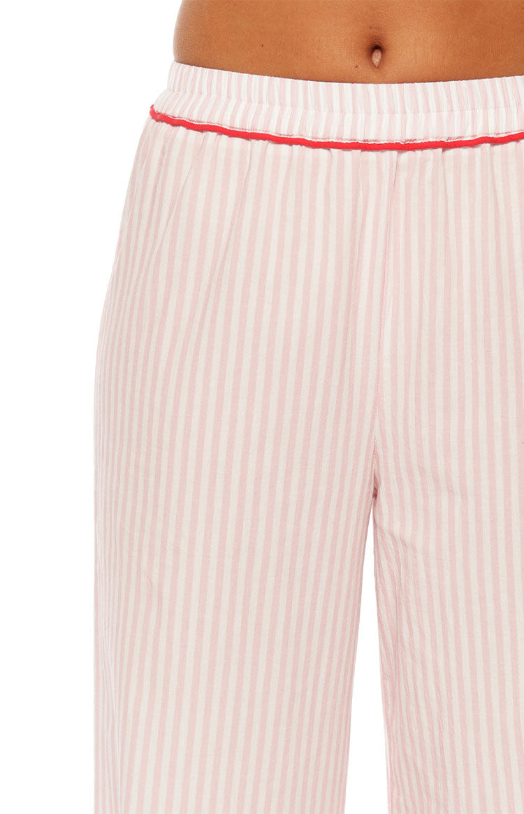 A close up of the Alexea Pink Stripe Pajama Pants showing the relaxed fit and soft fabric perfect for a luxurious night in.