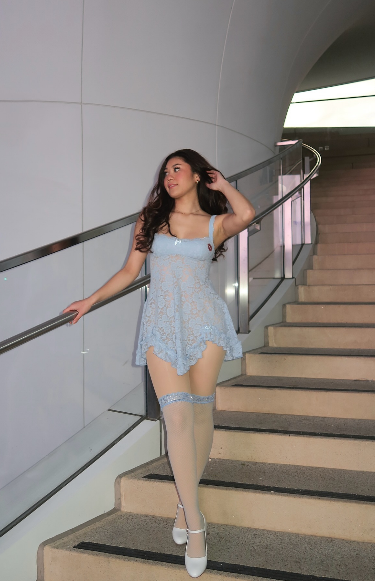 Blue lace mini dress on brunette model