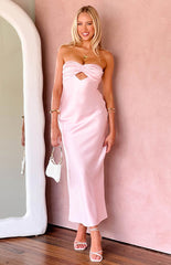 Blonde model wearing a light pink satin strapless maxi dress with a cutout bust detail