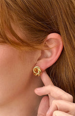 Gold knot stud earrings - the perfect finishing touch to any look!