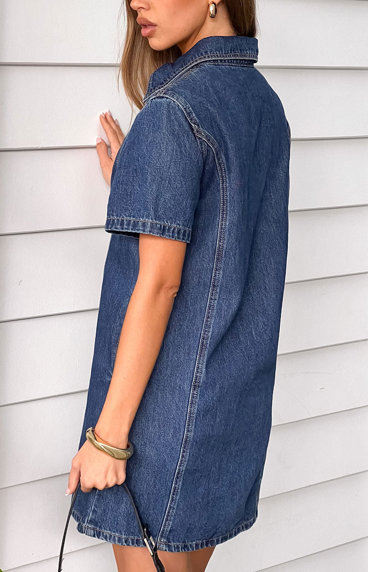 Girl in a dark denim mini dress perfect for a festival or casual day outfit.