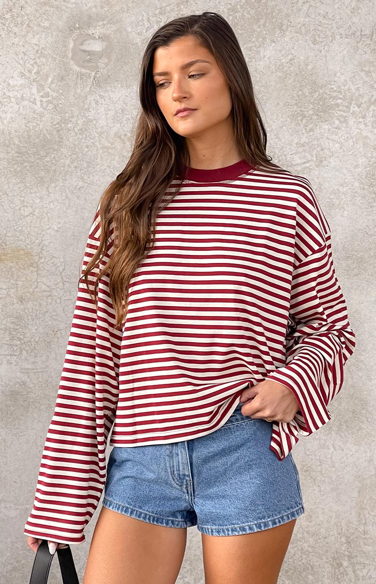 Wine red and white horizontal striped long-sleeve top with a wine red crew neck