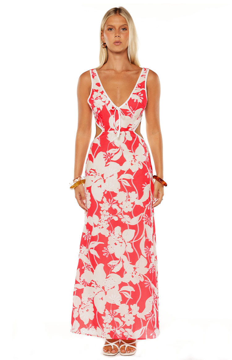Model in the Perez Red Floral Cut Out Maxi Dress a beautiful choice for a wedding guest or a summer formal event.