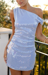 A light blue one-shoulder mini-dress covered in shimmering sequins featuring a draped sleeve and ruched detailing on the bodice. Our dress is suitable for a party or a night out.