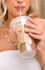 clear plastic tumbler cup with teddy graphic and straw