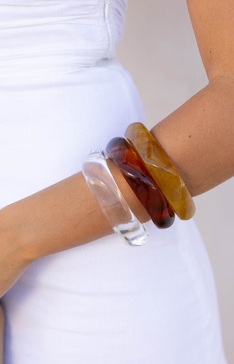 A close up of the Zantie Tortoiseshell Square Bangle a sophisticated resin bracelet perfect for stacking or wearing alone.