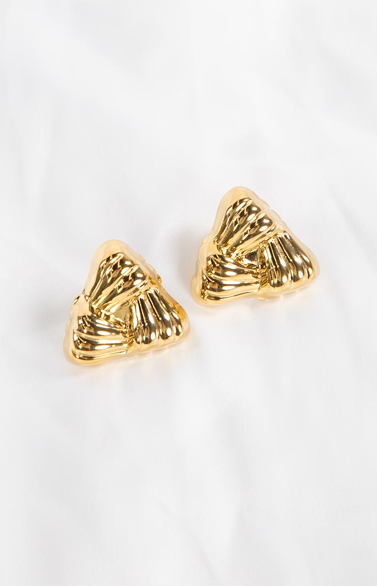 A pair of shiny gold triangle-shaped statement stud earrings with a textured- pleated design.